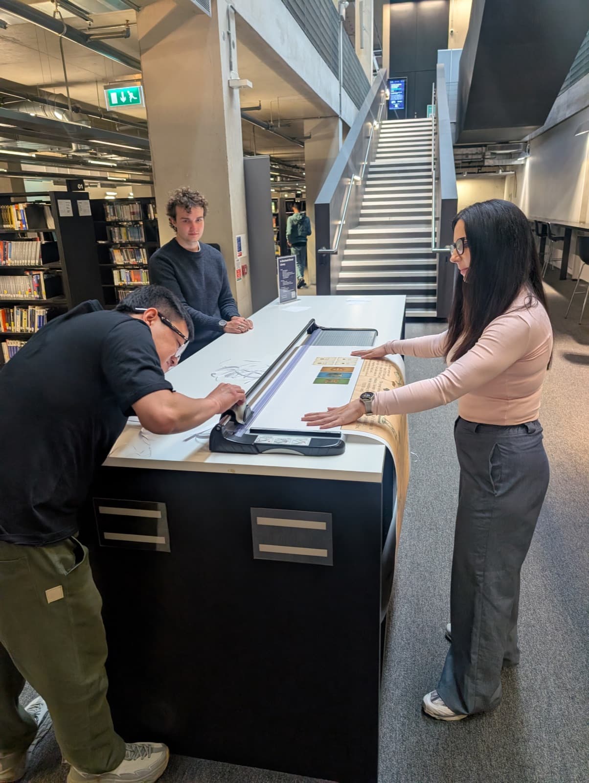 An ethixCube board being trimmed by hand after printing at Greenwich